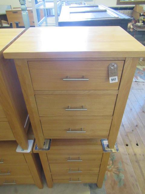 PAIR OF LIGHT OAK THREE DRAWER BEDSIDE CABINETS Image