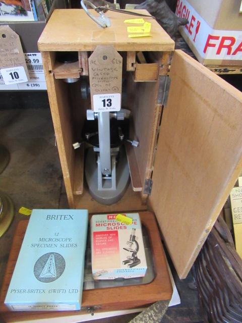 VINTAGE CASED MICROSCOPE AND A QUANTITY OF SLIDES Image