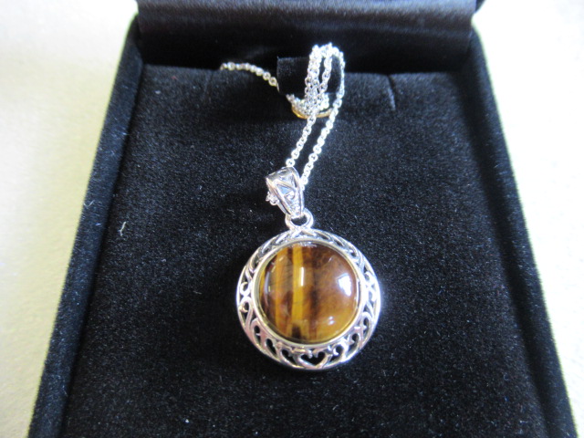 SILVER AND TIGERS EYE PENDANT ON SILVER CHAIN Image