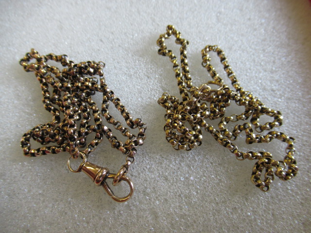 TWO YELLOW METAL CHAINS Image