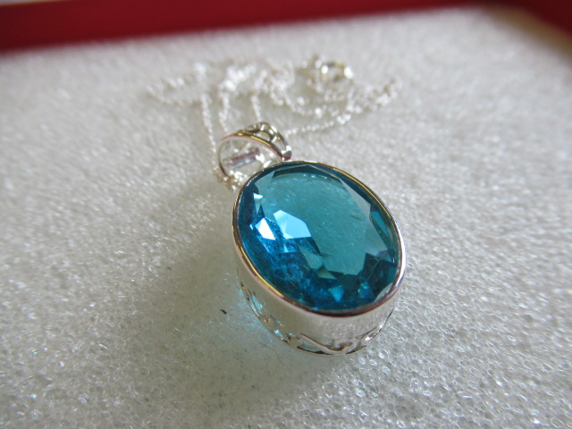 SILVER AND BLUE TOPAZ PENDANT ON CHAIN Image