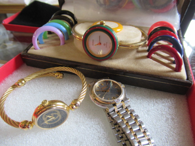 THREE GUCCI WATCHES Image