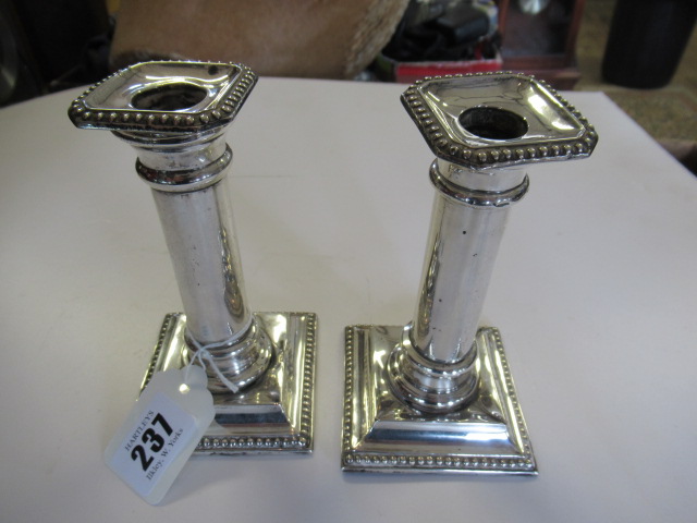 PAIR OF SILVER CANDLESTICKS Image