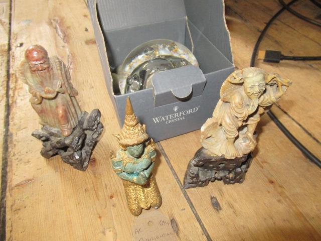THREE ORIENTAL FIGURES AND A PAPERWEIGHT Image