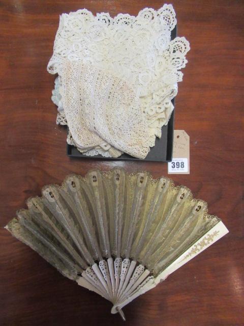 QUANTITY OF LACE AND A FAN Image