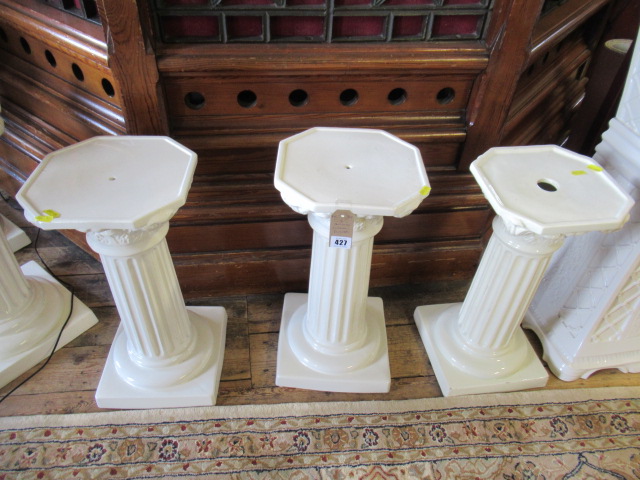 SET OF THREE POTTERY PLINTHS Image