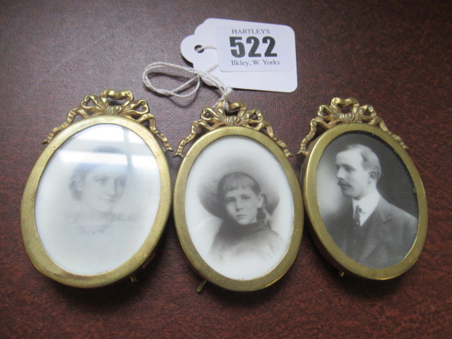 THREE BRASS FRAMED MINIATURES Image