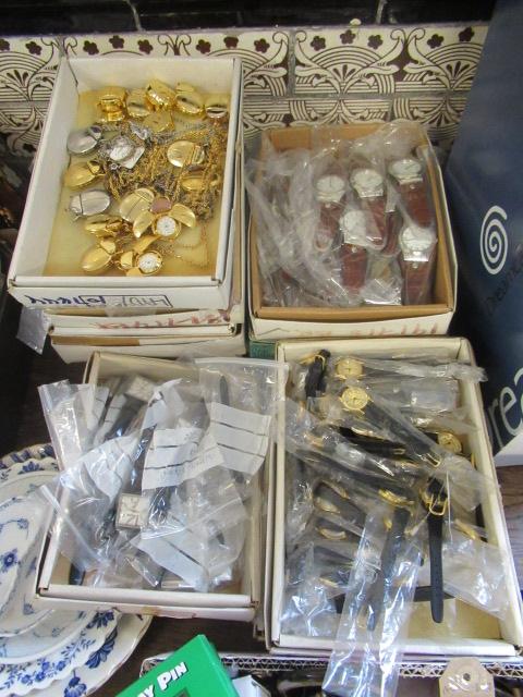 TEN BOXES OF WATCHES Image