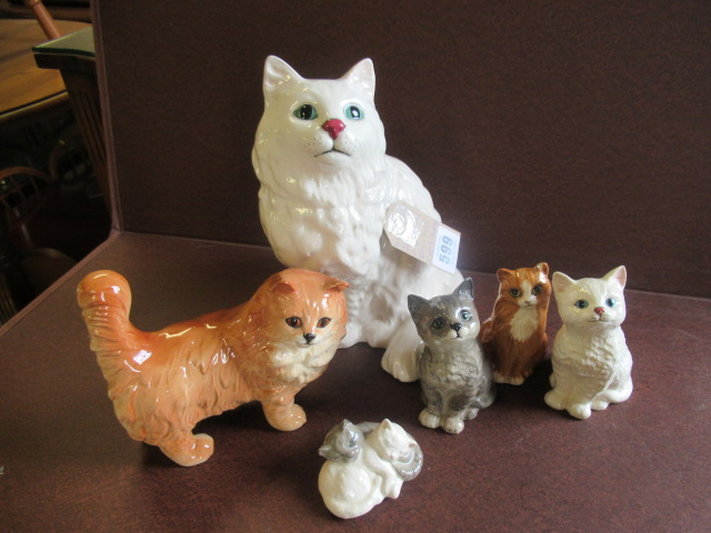 TWO BESWICK AND FOUR ROYAL DOULTON CATS Image