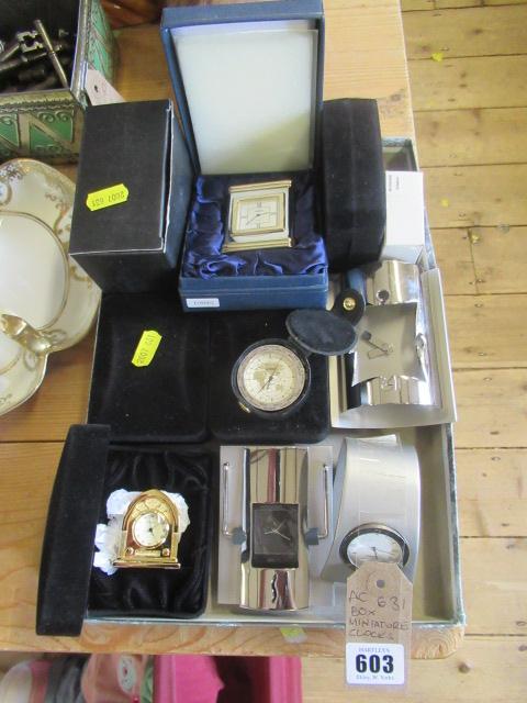 BOX OF MINIATURE CLOCKS Image
