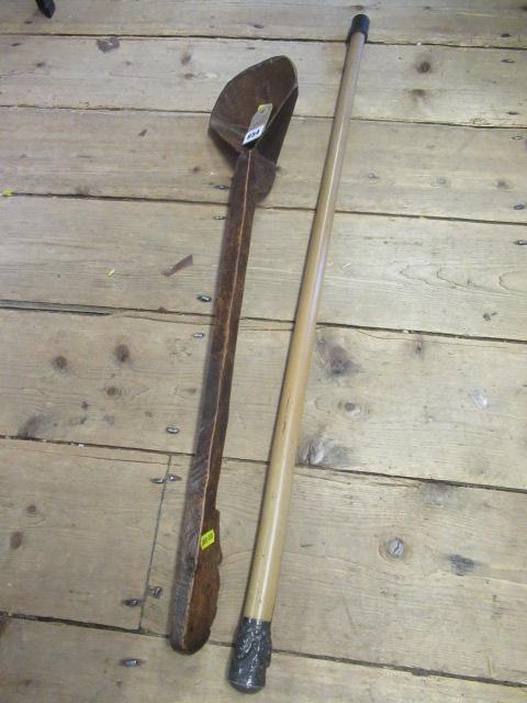 MALACCA SILVER TOP CANE AND A TREEN SPOON Image