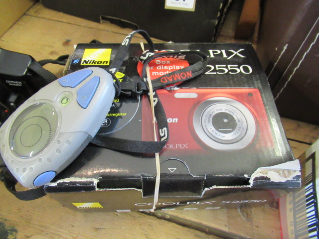 NIKON COOLPIC CAMERA AND DIGITAL COMPASS Image