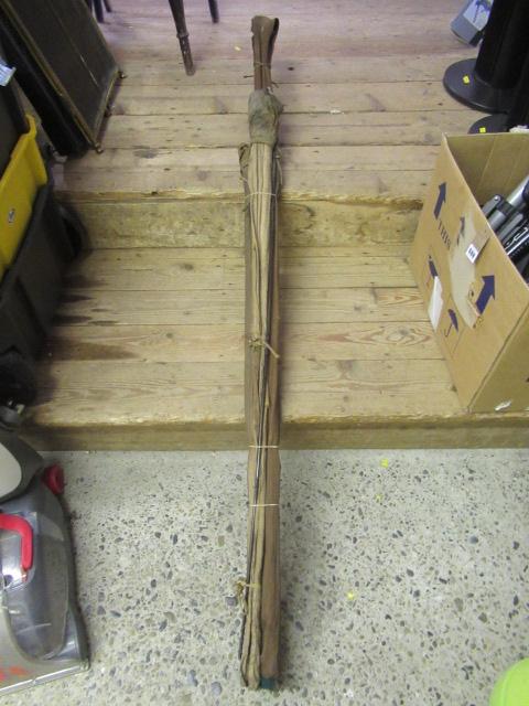 THREE VINTAGE FISHING RODS Image