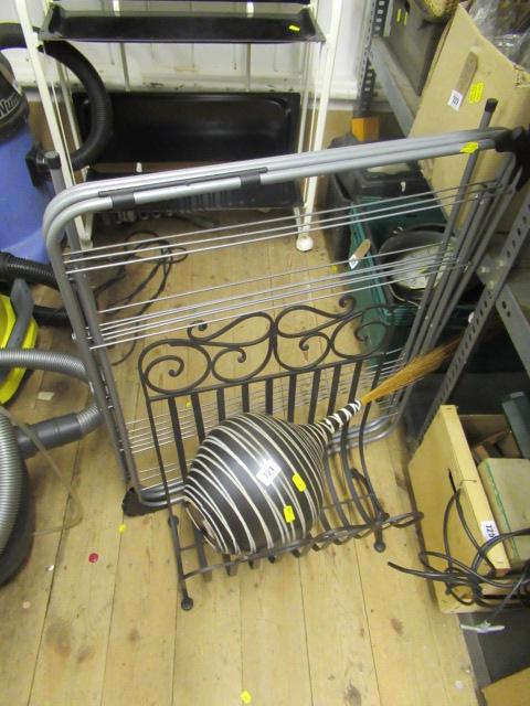 CERAMIC VASE CLOTHES RACK AND MAGAZINE RACK Image