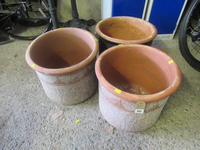 THREE SAND ETCHED GARDEN PLANTERS Image