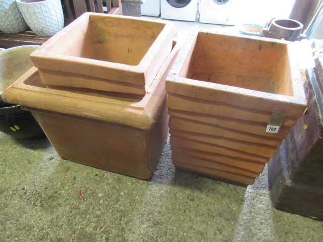 THREE LARGE TERRACOTTA PLANTERS Image