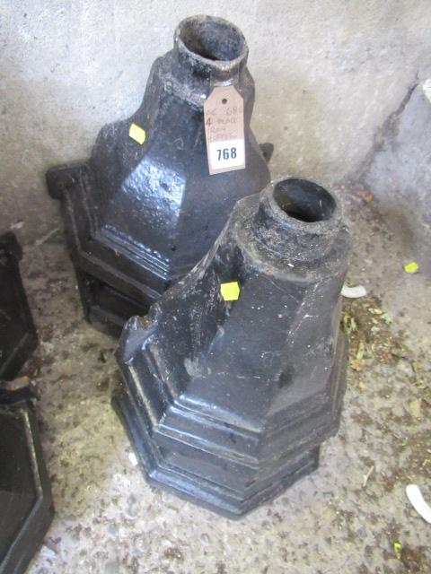 FOUR BLACK CAST IRON HOPPERS Image