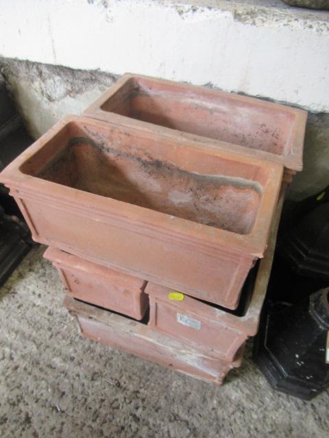 SIX TERRACOTTA PLANTERS Image