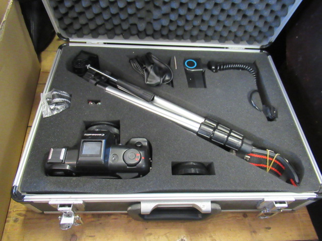 CASED CANOMATIC CAMERA AND ACCESSORIES Image