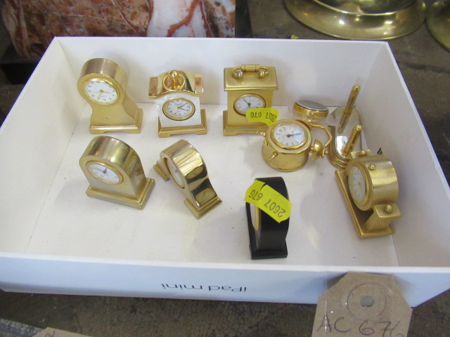 NINE MINIATURE CLOCKS Image