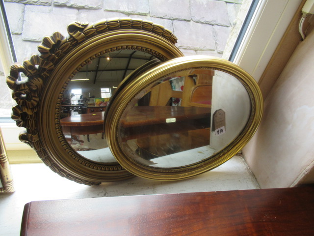 TWO OVAL MIRRORS Image