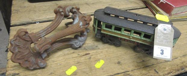 CAST IRON CARRIAGE AND A DOOR KNOCKER Image