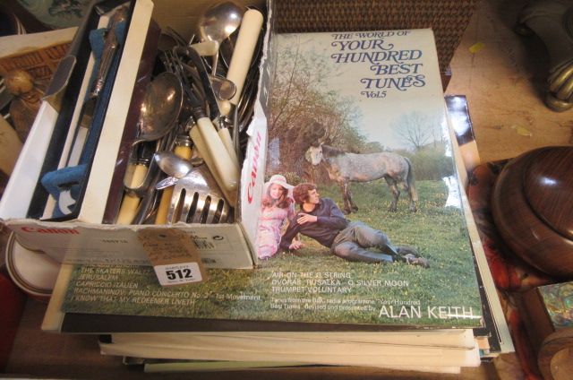 BOX OF CUTLERY AND A STACK OF RECORDS Image