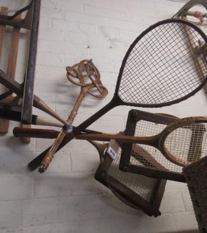 FOUR BADMINTON RACKETS AND A CARPET BEATER Image