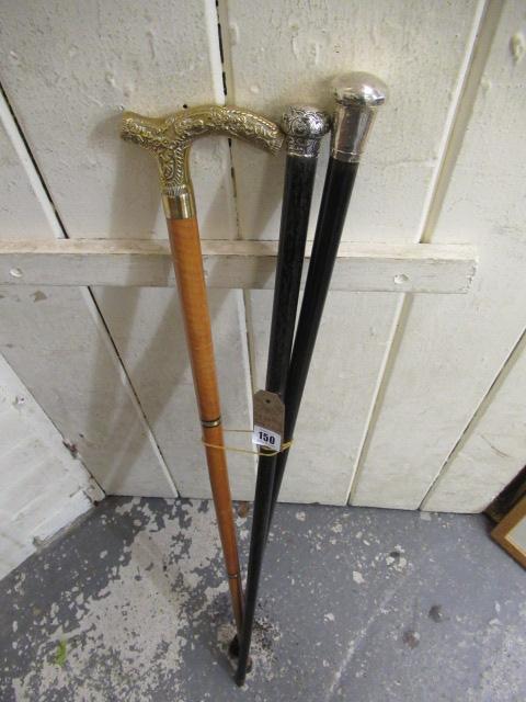 TWO SILVER TOPPED WALKING STICKS AND ANOTHER Image