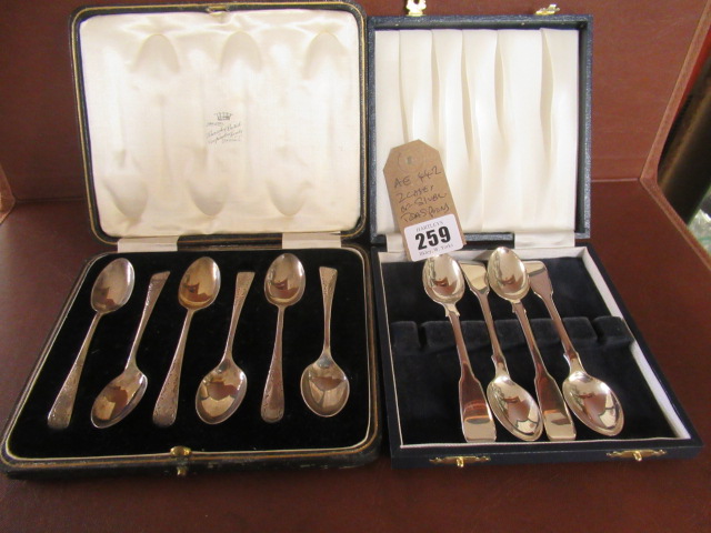 TWO CASES OF SILVER TEAPOONS Image