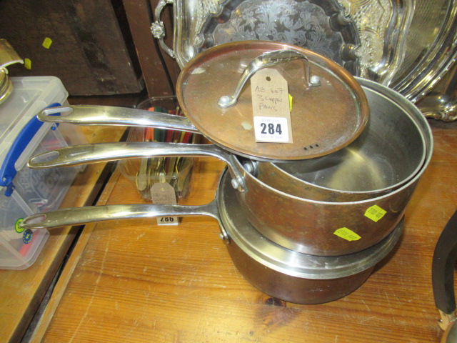THREE COPPER PANS Image