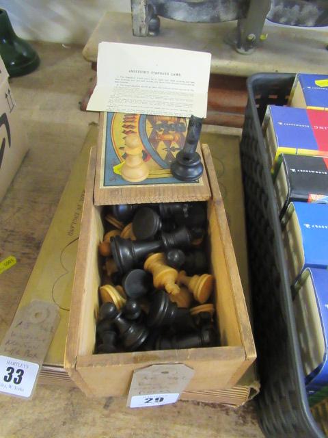 BOX OF CHESS PIECES Image