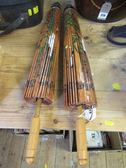 TWO BAMBOO PARASOLS Image