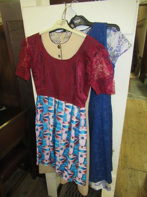 FOUR DRESSES Image