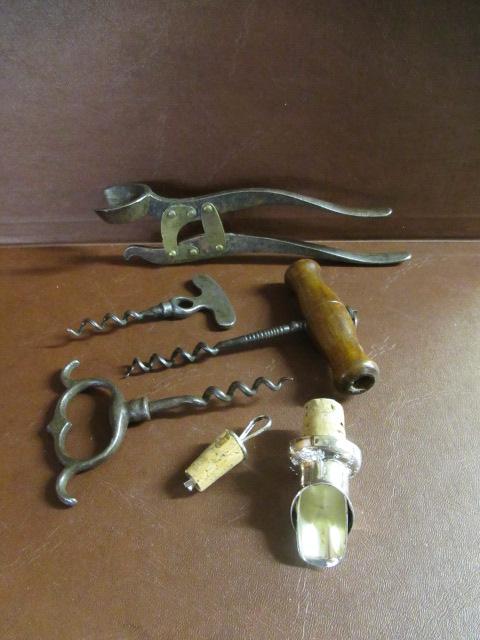 QUANTITY OF ANTIQUE CORK SCREWS AND BOTTLE OPENERS ETC Image
