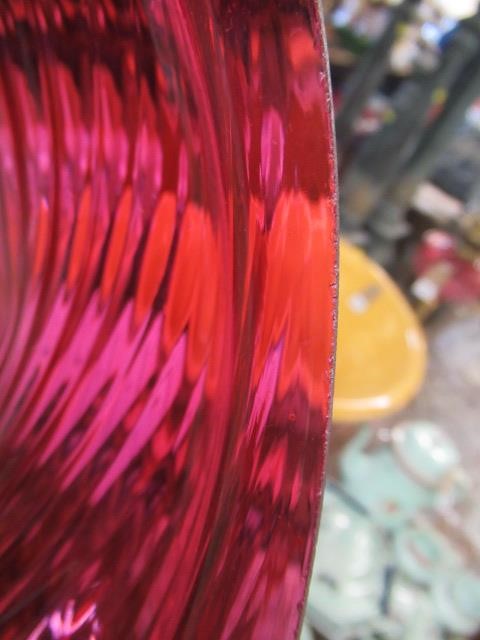 CRANBERRY AND GLASS OIL LAMP AND TWO GLASS CHIMNEYS Image