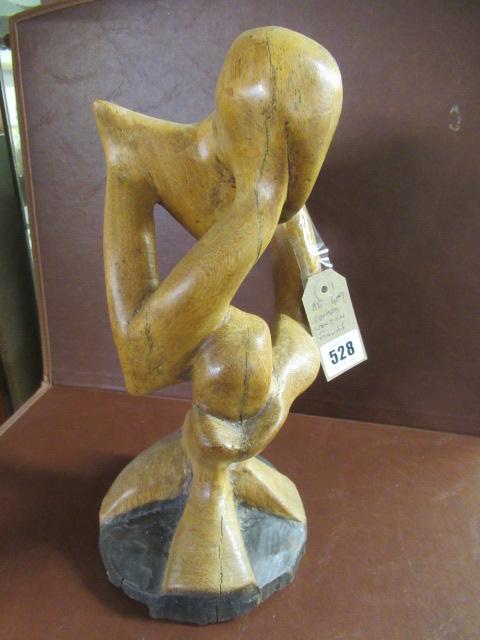 CARVED WOODEN FIGURE Image