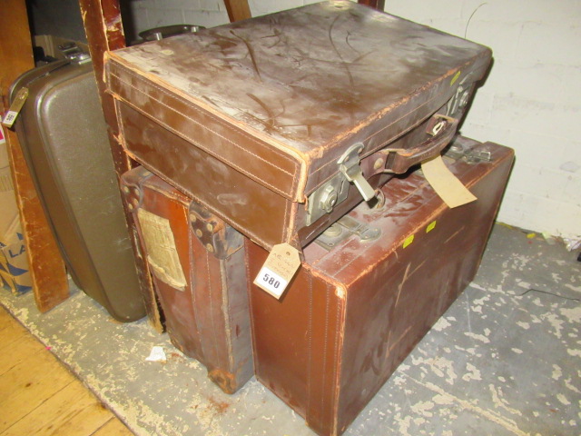 FIVE VINTAGE SUITCASES Image