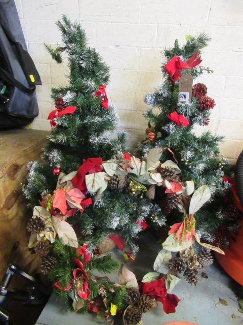 TWO ORNAMENTAL CHRISTMAS TREES AND A WREATH Image