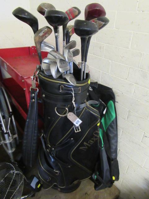 GOLF BAG CLUBS AND A CRICKET BAG Image