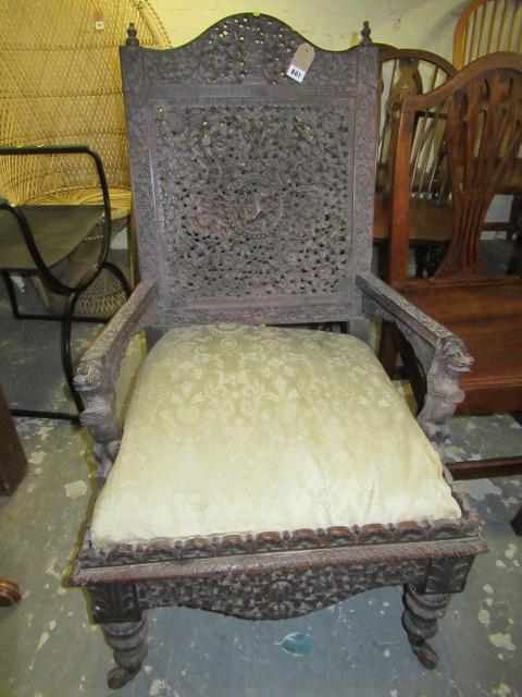 ASIAN HEAVILY CARVED ARMCHAIR Image
