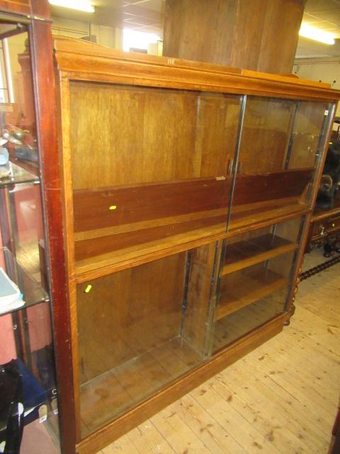 GLASS FRONTED OAK BOOKCASE Image