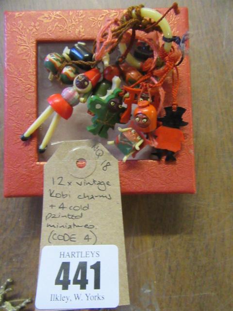 TWELVE VINTAGE KOBI CHARMS AND FOUR COLD PAINTED MINIATURES Image