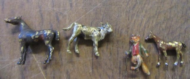 TWELVE VINTAGE KOBI CHARMS AND FOUR COLD PAINTED MINIATURES Image