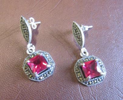 PAIR OF RED STONE AND MARCASITE SILVER EARRINGS Image