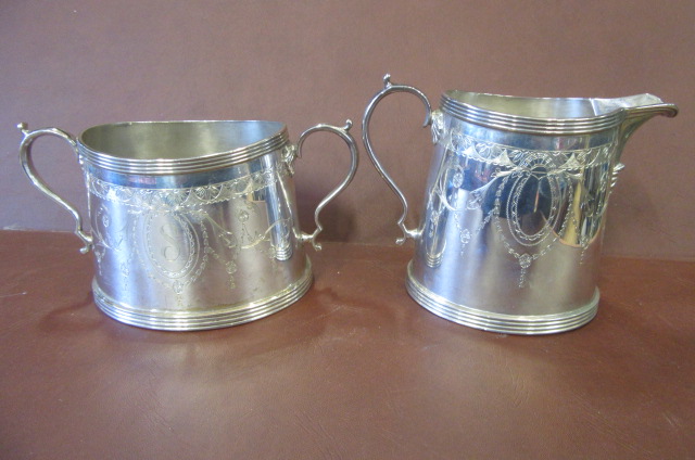 SILVER MILK JUG AND SUGAR BASIN Image