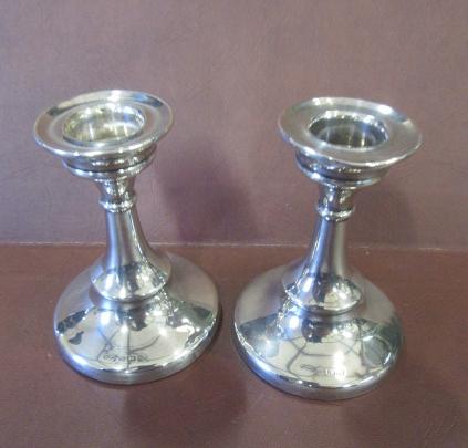 PAIR OF SMALL SILVER CANDLESTICKS Image