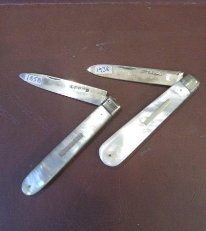 TWO SILVER FOLDING FRUIT KNIVES Image