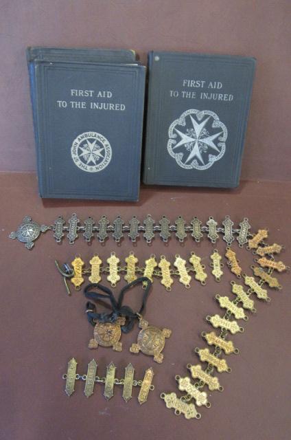 ST JOHNS AMBULANCE BADGES AND BOOKS Image