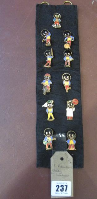 ELEVEN ROBERTSON'S GOLLY ENAMEL BADGES Image